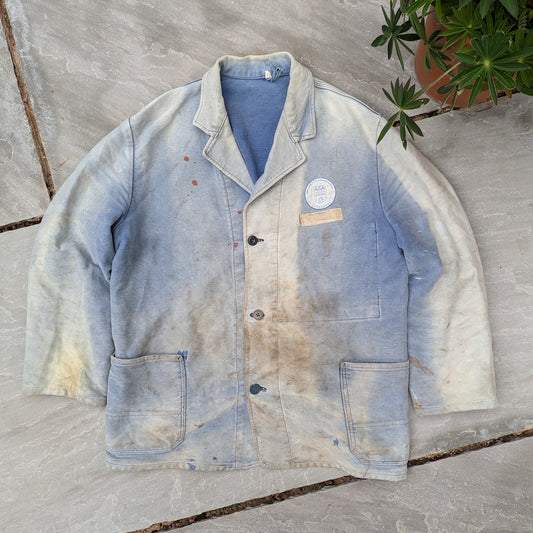 French faded and thrashed university jacket